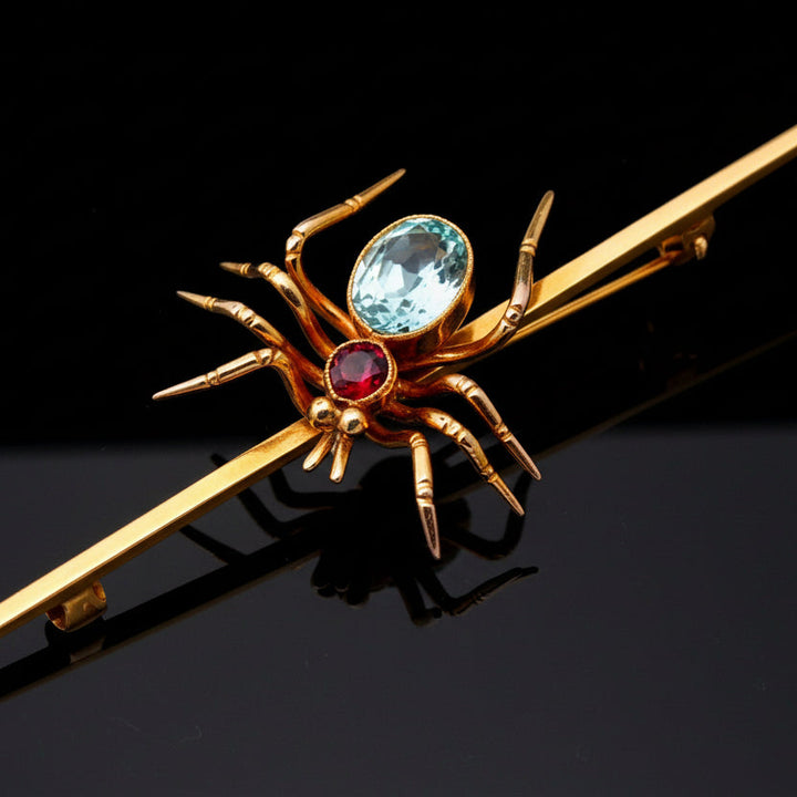 English Aquamarine, Ruby Spider and 9K Yellow Gold Brooch