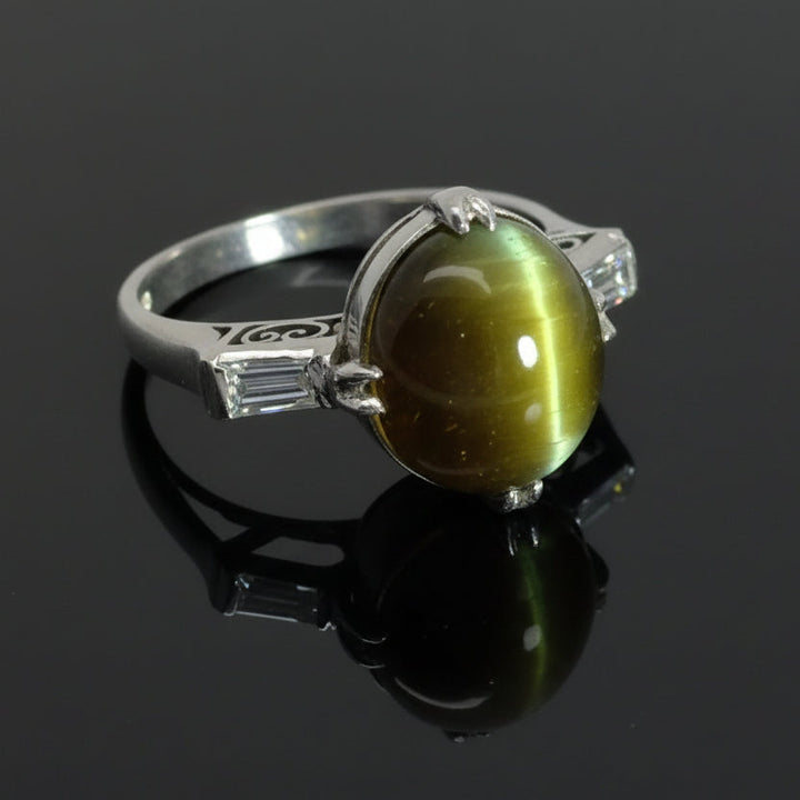 Cat's Eyes Tourmaline, Diamond and Platinum Three-Stone Ring
