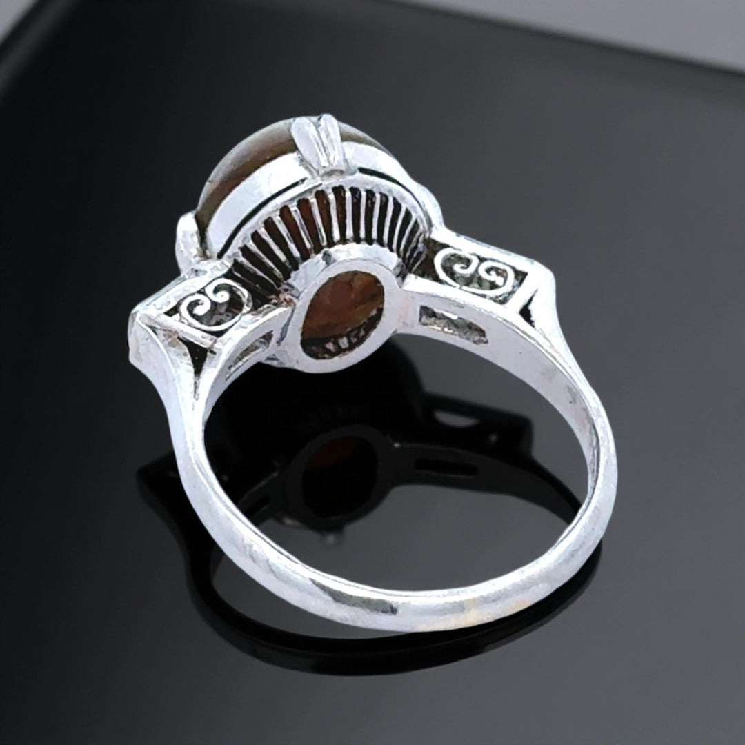 Cat's Eyes Tourmaline, Diamond and Platinum Three-Stone Ring