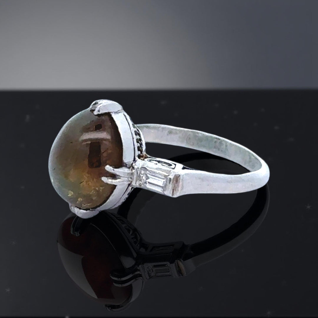 Cat's Eyes Tourmaline, Diamond and Platinum Three-Stone Ring