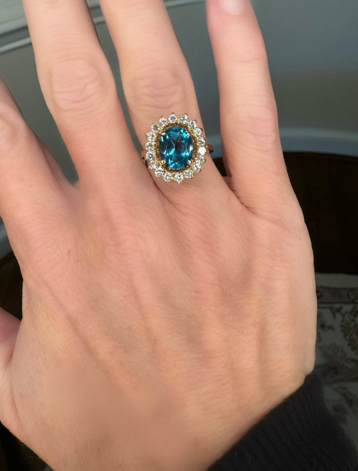 Oval Blue Topaz, Diamond and 14K Yellow Gold Ring