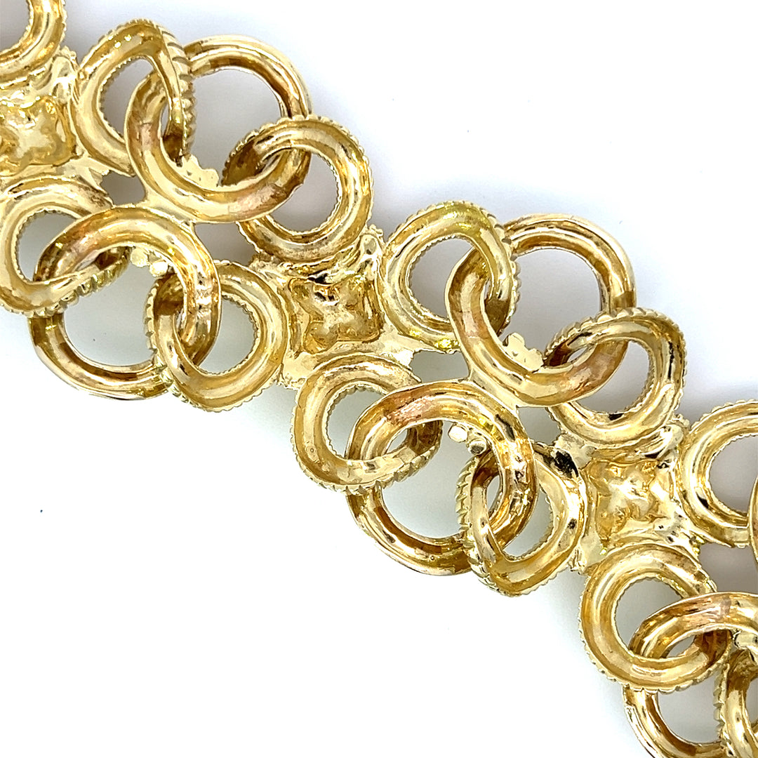 Bold Gold 18K Yellow Gold Circle Link and Flower Motif Bracelet