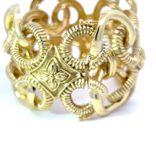 Bold Gold 18K Yellow Gold Circle Link and Flower Motif Bracelet