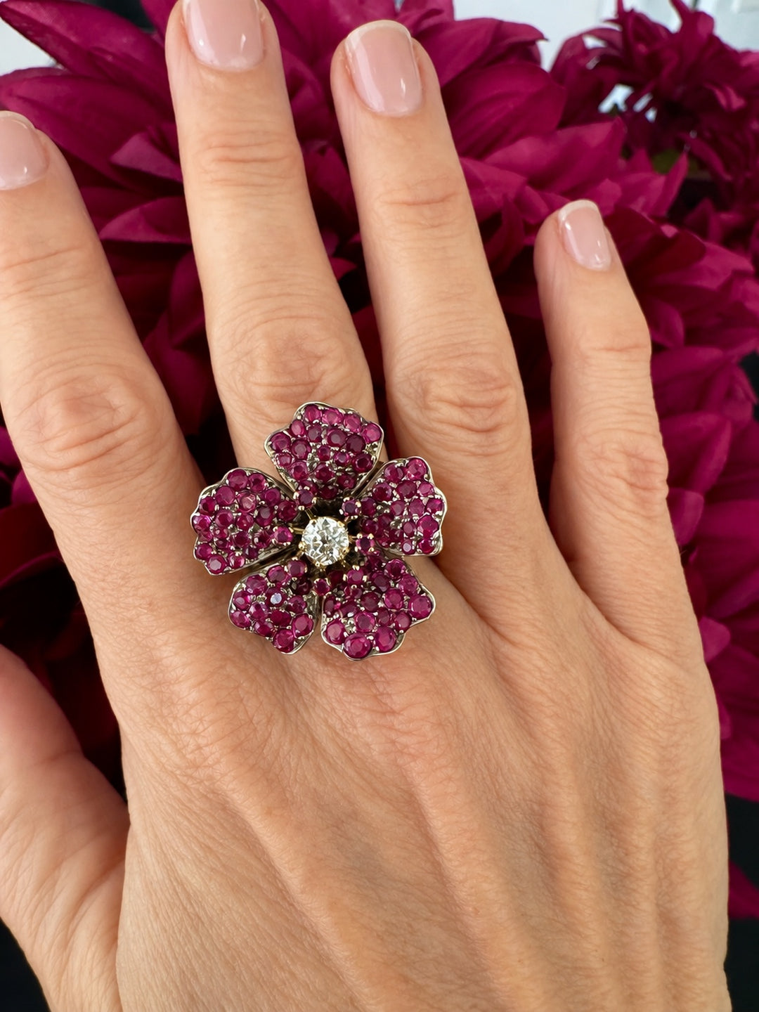 18K yellow gold ruby and diamond flower ring – worn on hand