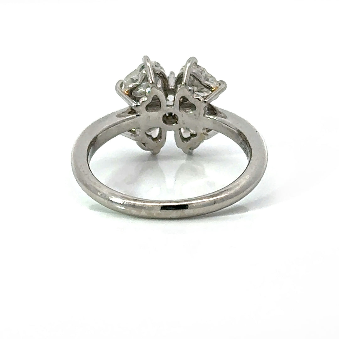 Underside view showing open clover gallery and platinum band