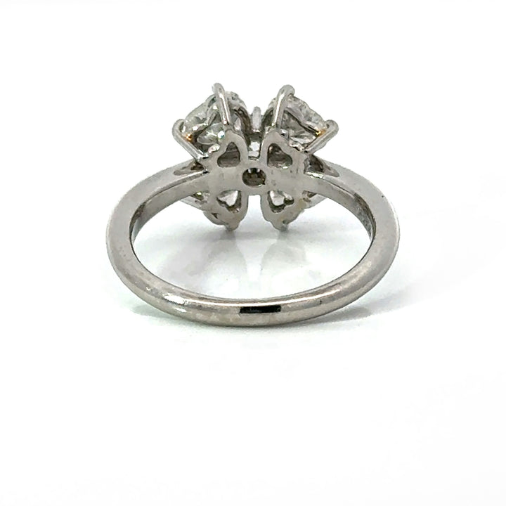 Underside view showing open clover gallery and platinum band