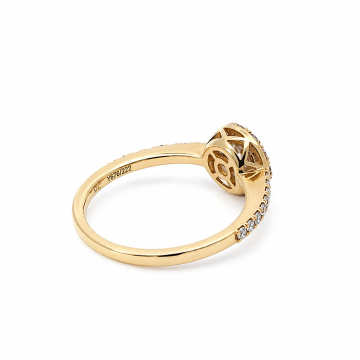Estate round diamond halo ring in 14K yellow gold, back and gallery view