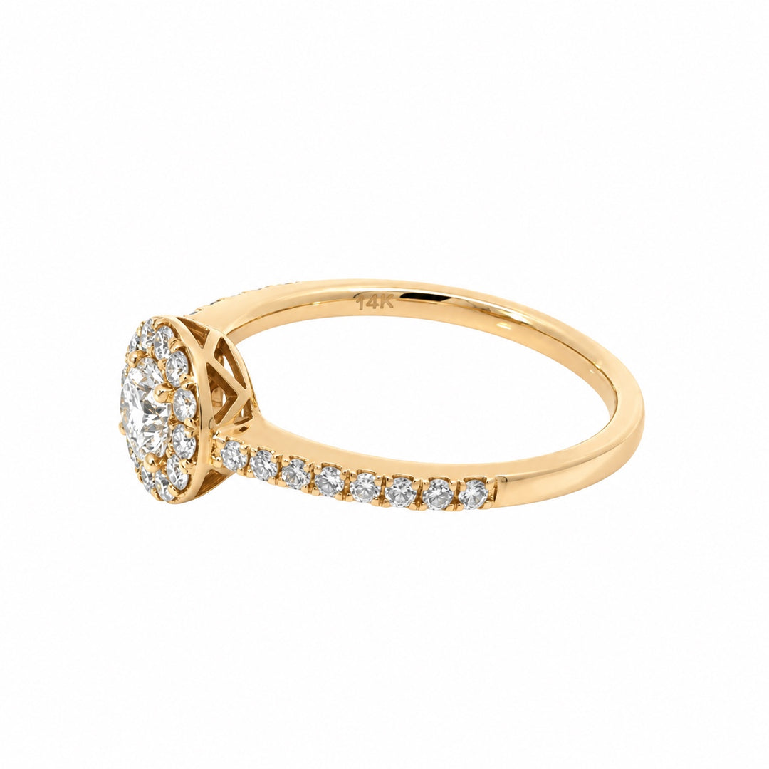 Estate round diamond halo ring in 14K yellow gold, side view