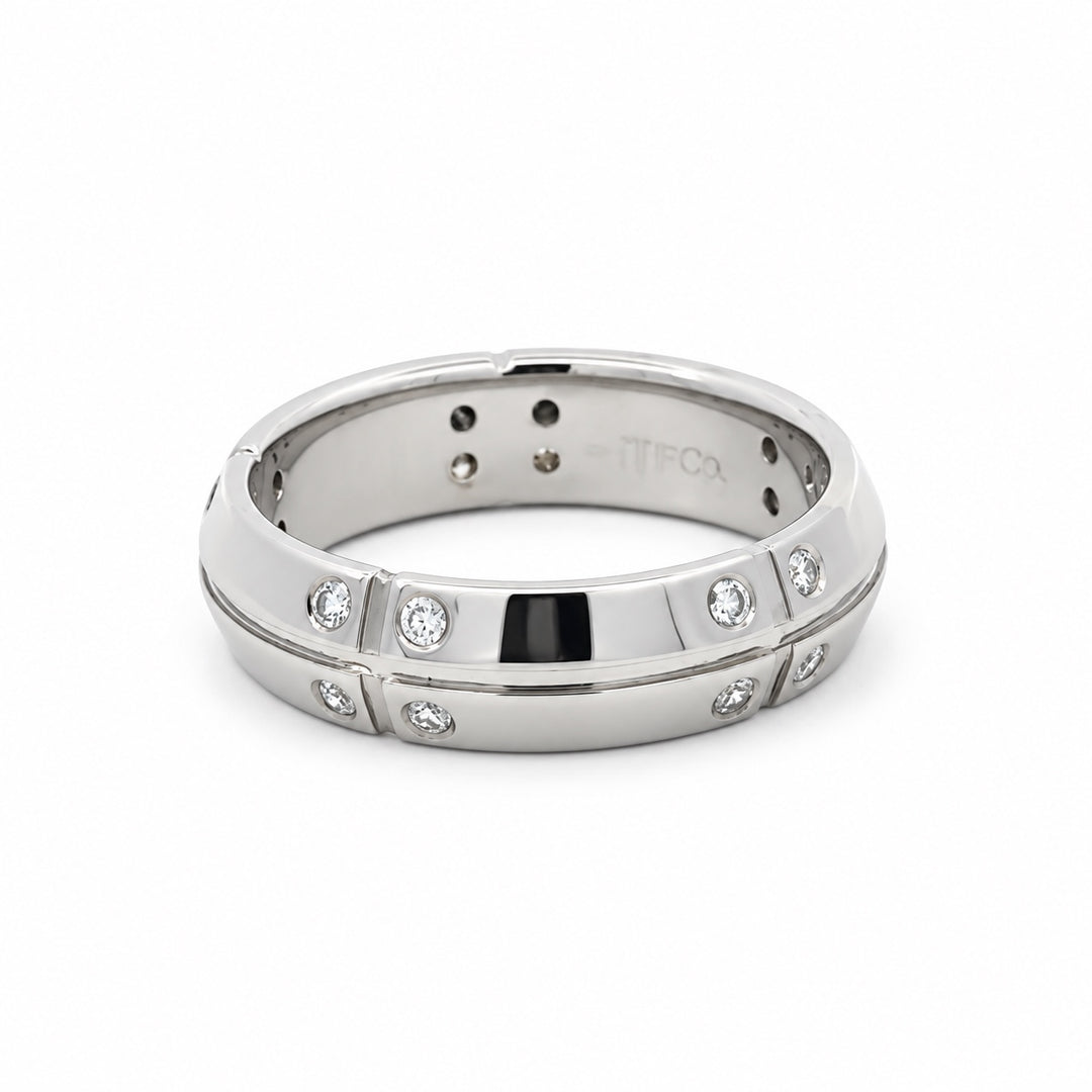 Tiffany & Co. Streamerica diamond band ring in 18K white gold showing signature