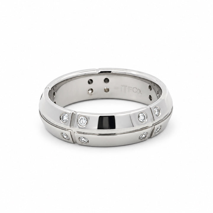 Tiffany & Co. Streamerica diamond band ring in 18K white gold showing signature