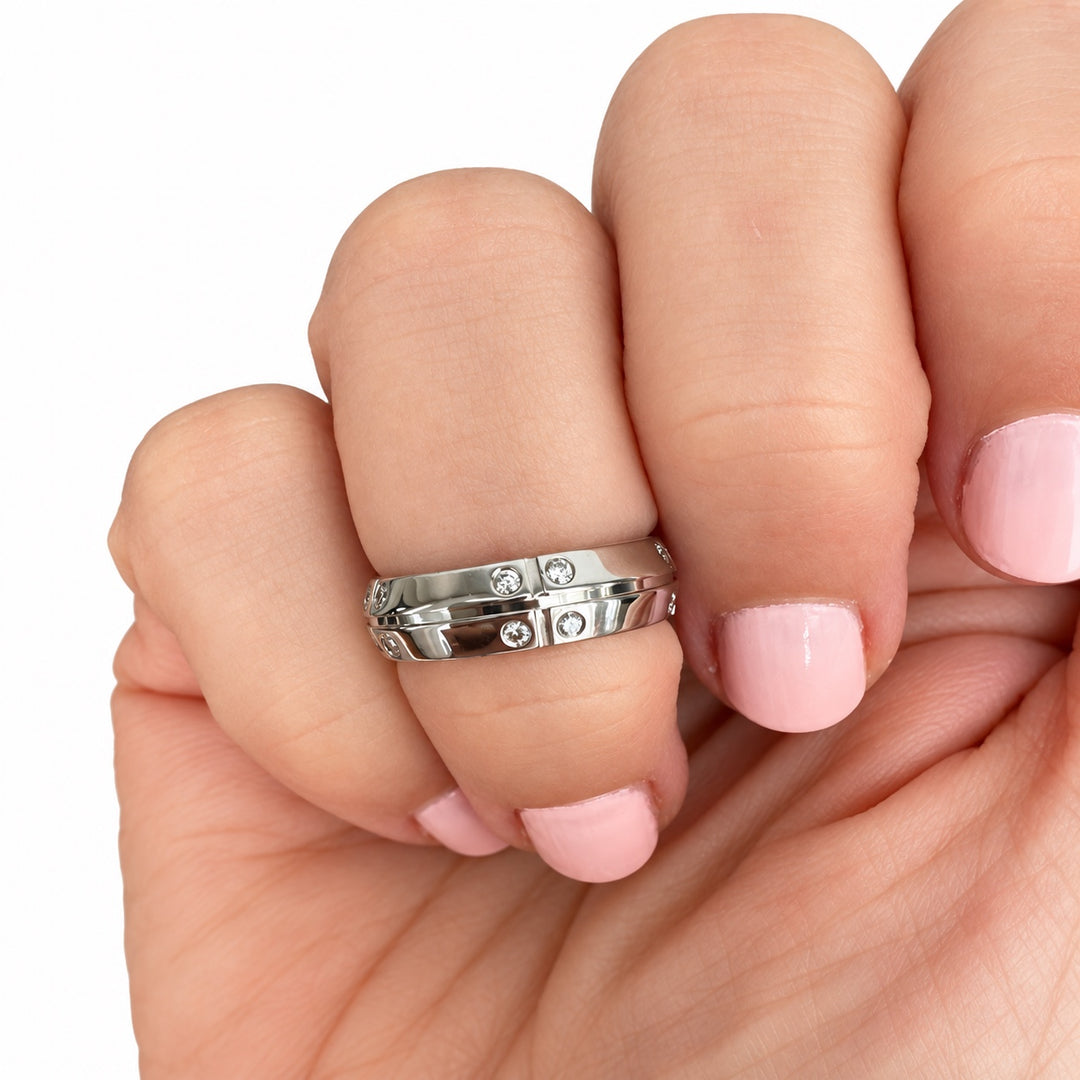 Tiffany & Co. Streamerica diamond band ring in 18K white gold shown on hand