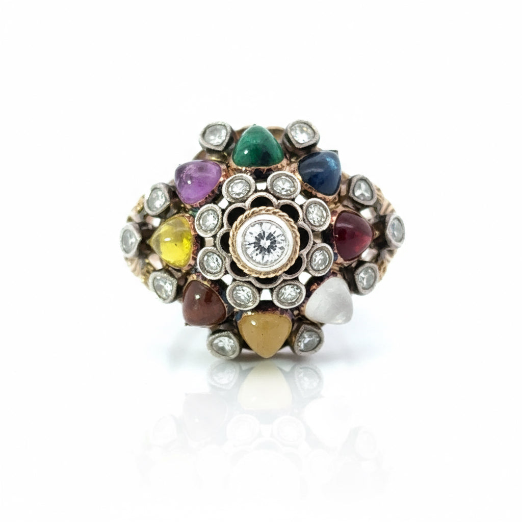 Multicolored gemstone ring with a central diamond on a white background