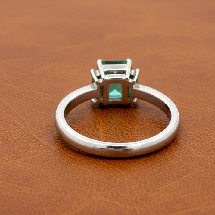 Modern Emerald and Diamond Platinum Ring
