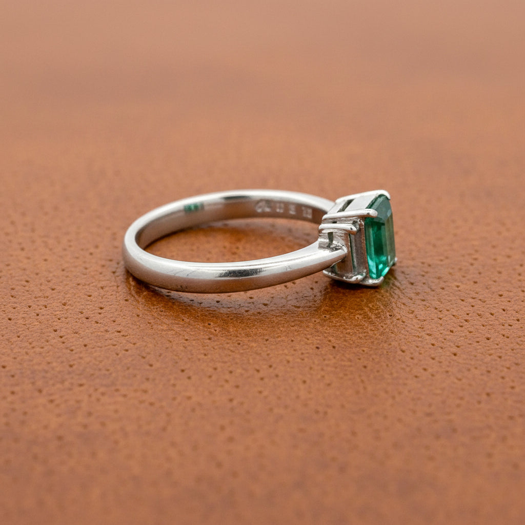 Modern Emerald and Diamond Platinum Ring