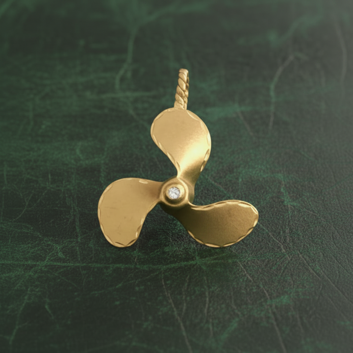 Modern 1960's Diamond and 14k Yellow Gold Nautical Prop Pendant