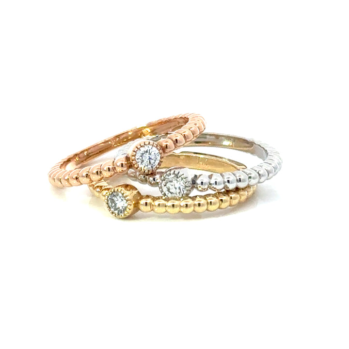 Set of Three Yellow, Rose and White 14k Gold Bezel Set Natural Diamond Ring