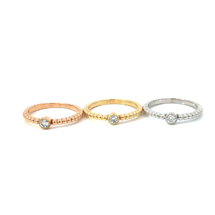 Set of Three Yellow, Rose and White 14k Gold Bezel Set Natural Diamond Ring