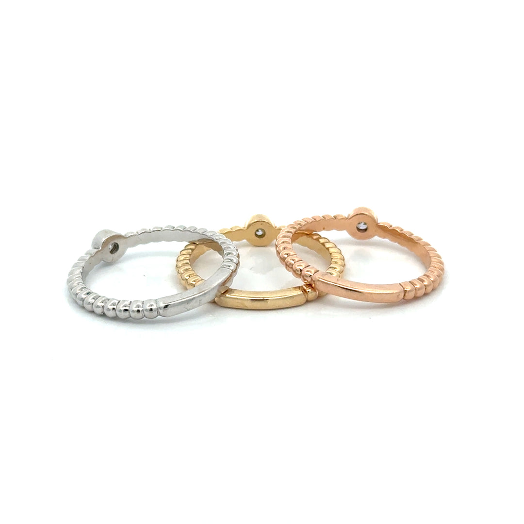 Set of Three Yellow, Rose and White 14k Gold Bezel Set Natural Diamond Ring