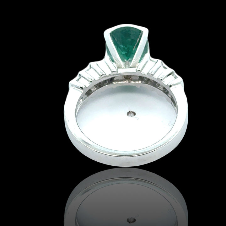 Oval Emerald and Diamond Platinum Ring