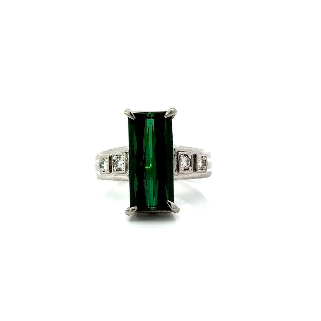 Front view of estate green tourmaline and diamond platinum ring