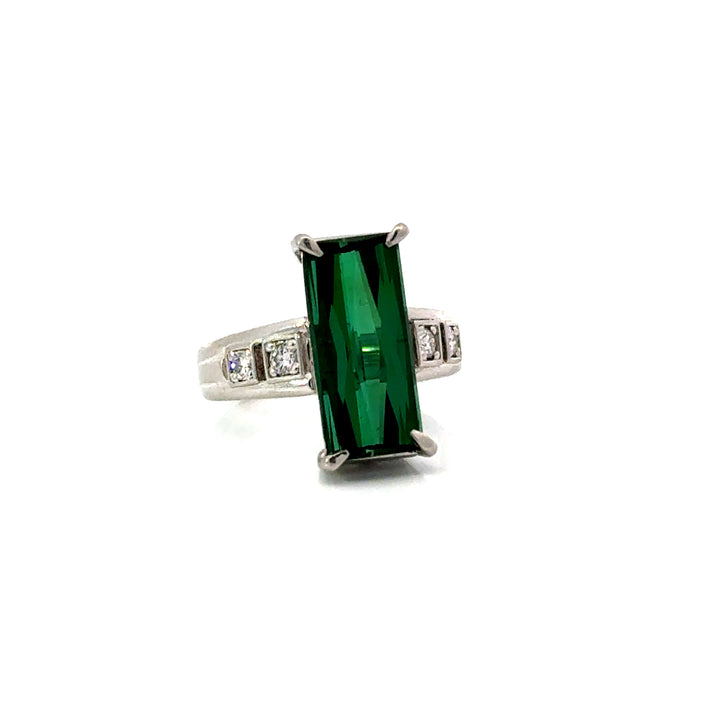 Angled view of green tourmaline and diamond estate ring