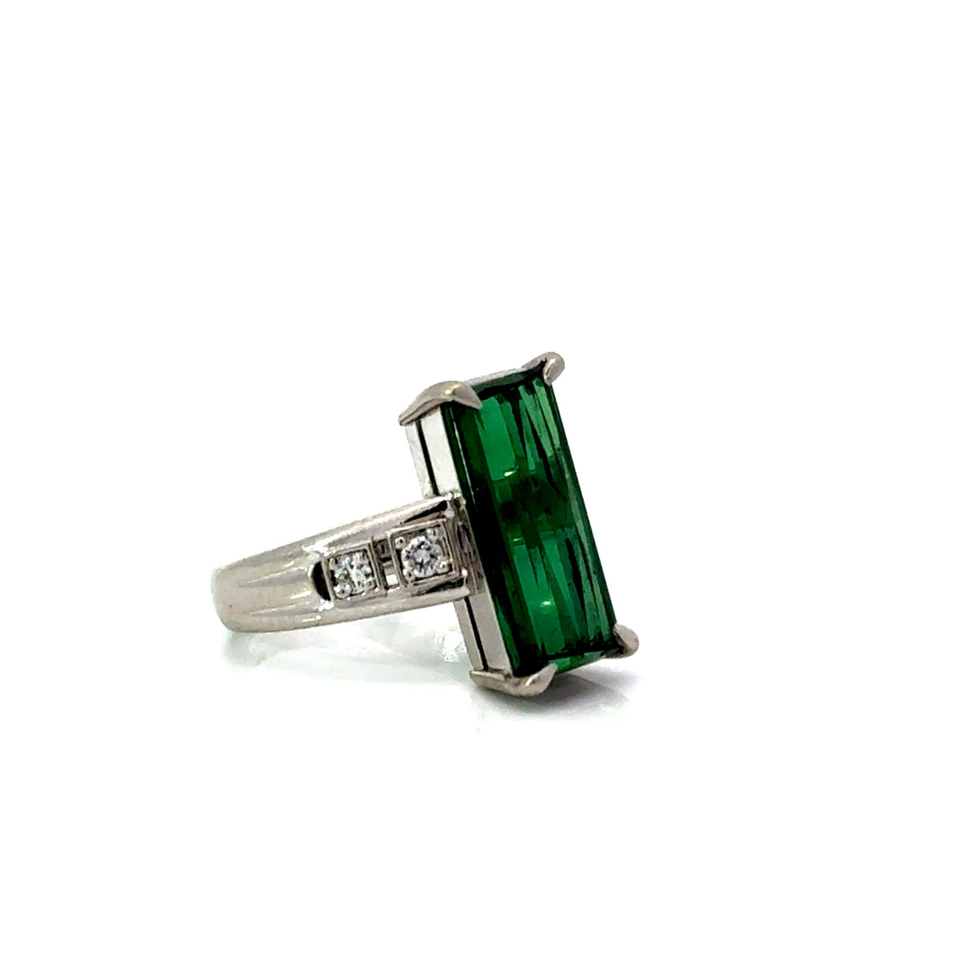Side view of platinum green tourmaline and diamond ring