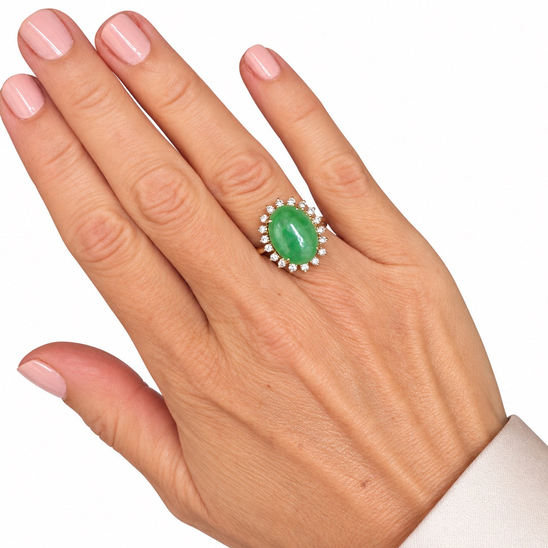 Vintage 14K yellow gold jade and diamond halo ring shown on hand