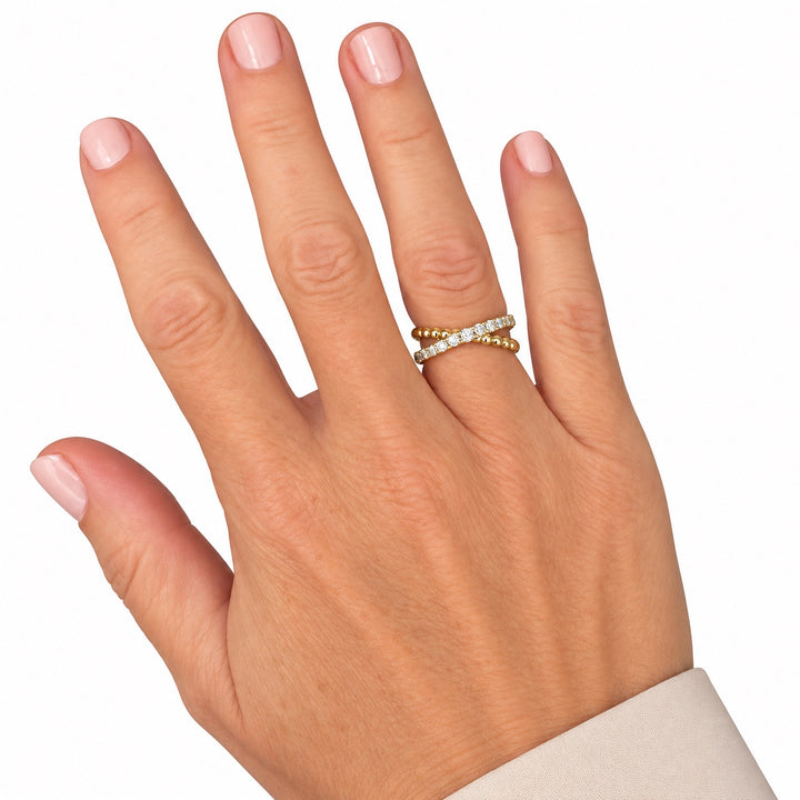 14K yellow gold diamond beaded X ring shown on hand